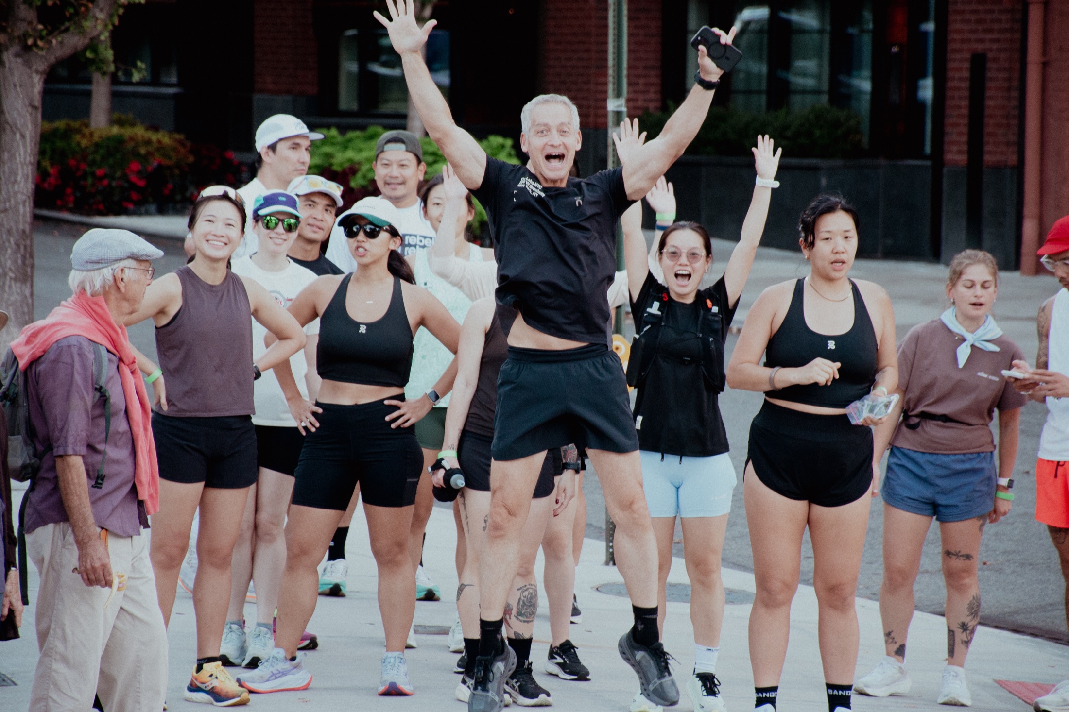 Runners celebrating together at a Proof event